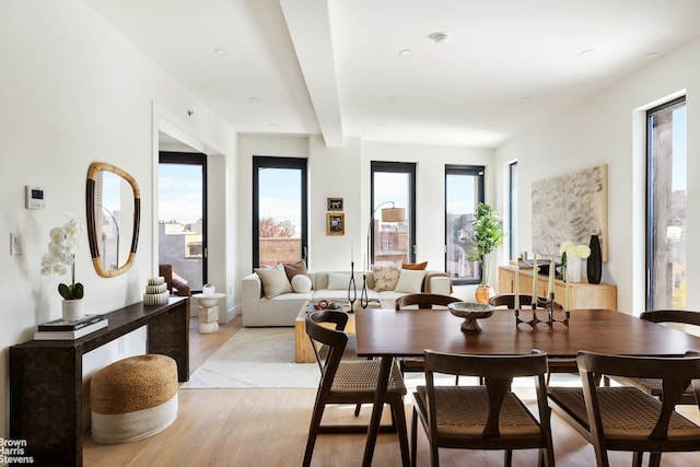 dining space with light wood finished floors