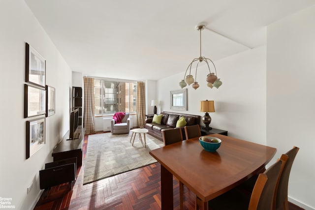 dining area with a notable chandelier