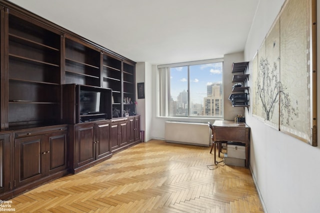 interior space featuring baseboards