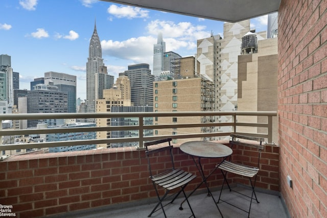 balcony featuring a city view