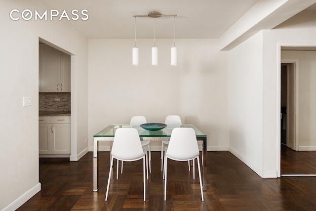 dining space with baseboards