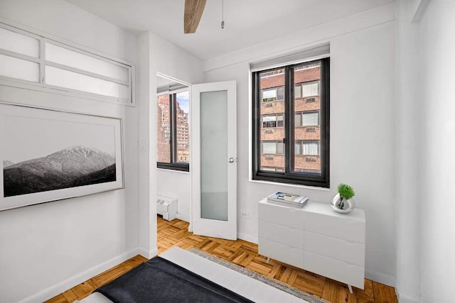 425 E 63rd St Unit W11B, New York City, NY 10065 - doorway featuring ceiling fan and baseboards