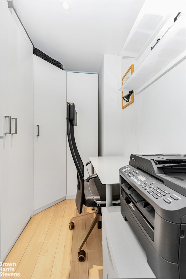 office area featuring light wood finished floors
