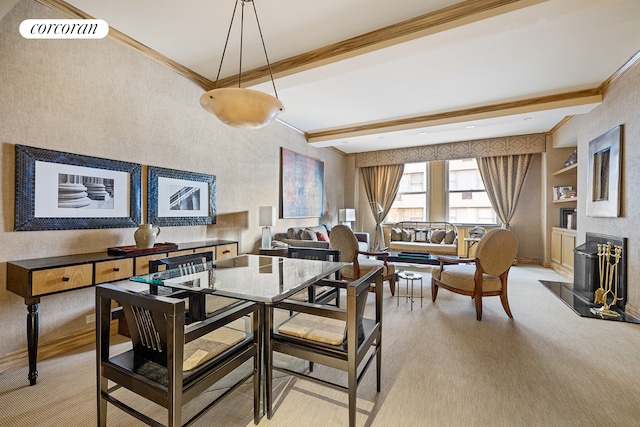 dining area featuring beamed ceiling, a fireplace, crown molding, and visible vents