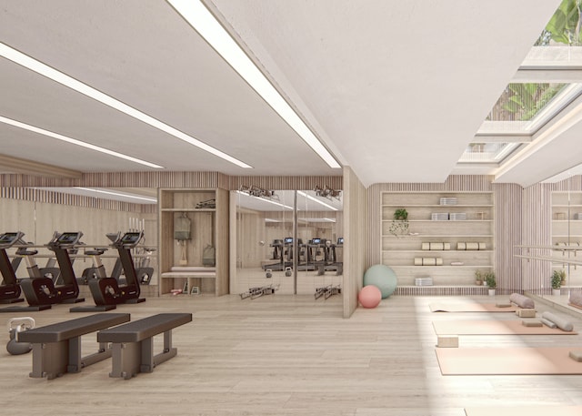 workout area featuring wood finished floors
