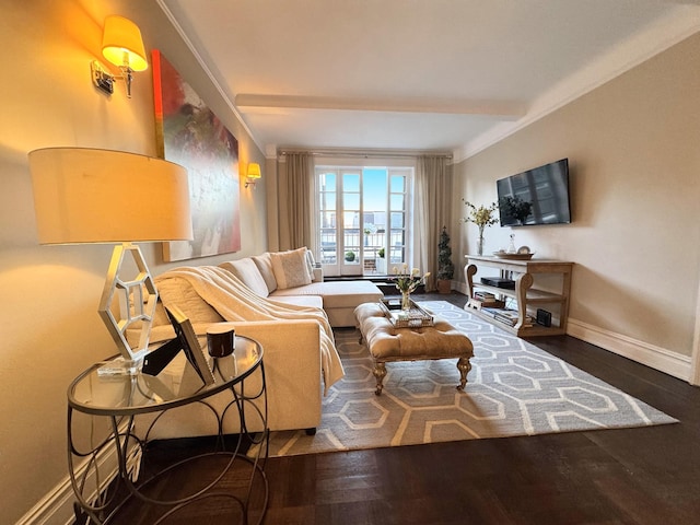 living room featuring beamed ceiling, baseboards, and wood finished floors