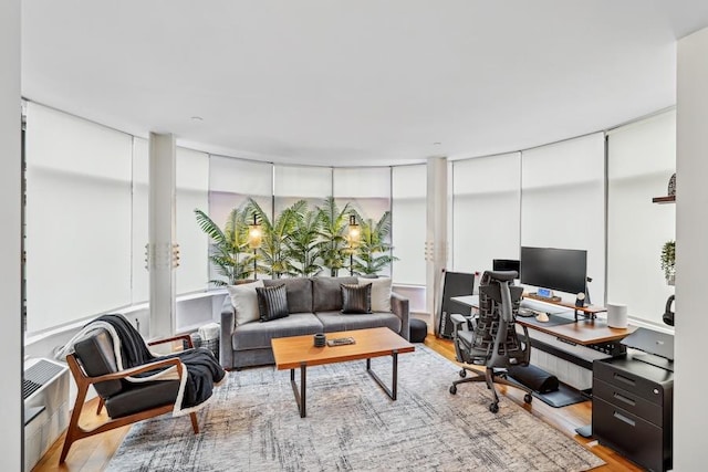 office space with light wood finished floors