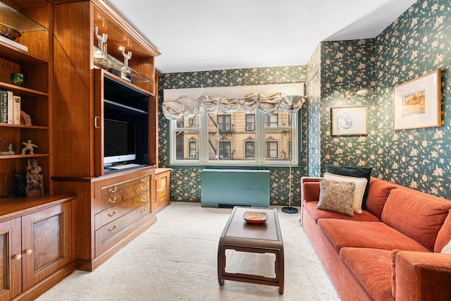 living room with carpet flooring and wallpapered walls