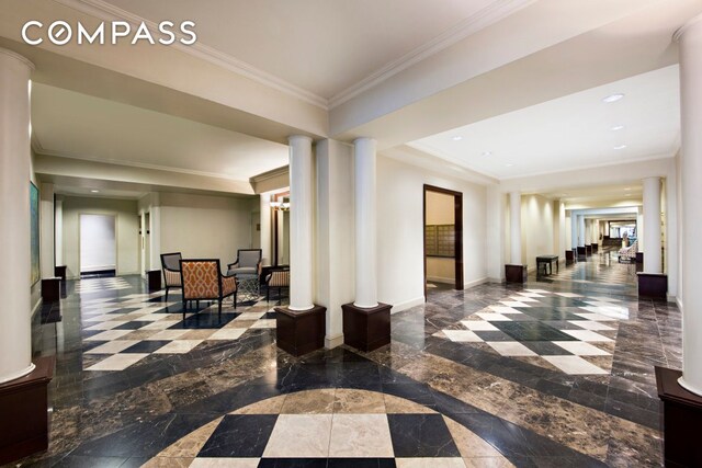 305 E 72nd St Unit 13I, New York City, NY 10021 - building lobby featuring ornamental molding and recessed lighting