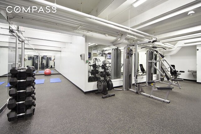 305 E 72nd St Unit 13I, New York City, NY 10021 - exercise room with baseboards