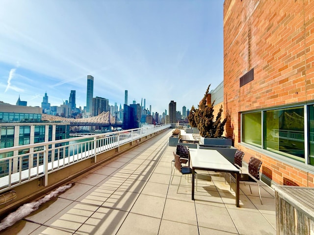 view of patio / terrace with a city view