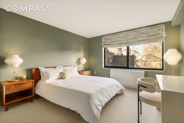 carpeted bedroom featuring vaulted ceiling