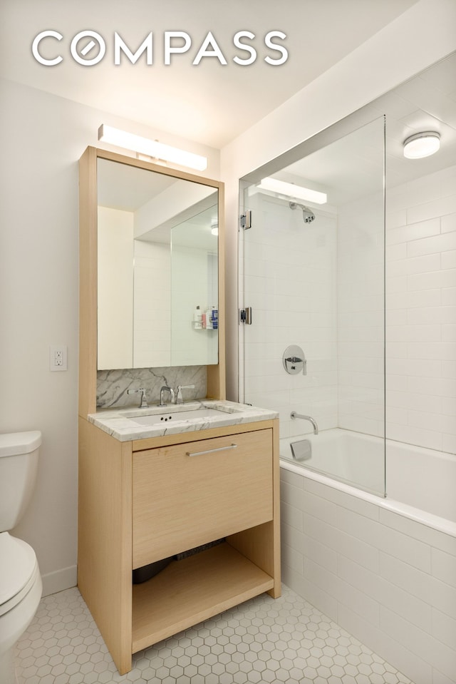 101 W 87th St Unit 415, New York City, NY 10024 - bathroom featuring toilet, tile patterned flooring, vanity, and tiled shower / bath