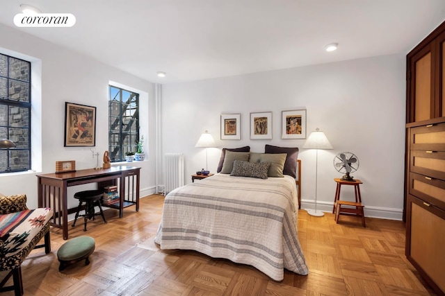 116 Pinehurst Ave Unit G33, New York City, NY 10033 - bedroom featuring radiator heating unit and recessed lighting