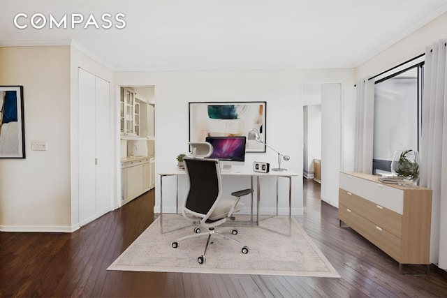 home office with baseboards, ornamental molding, and dark wood-type flooring