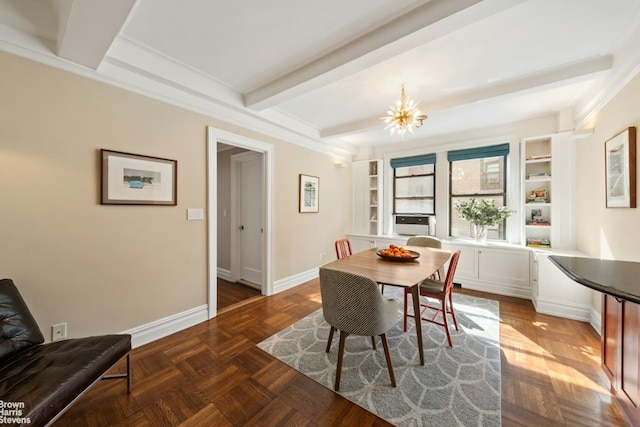 dining room featuring built in shelves, a notable chandelier, beamed ceiling, and baseboards