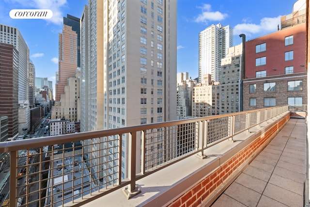 balcony featuring a city view