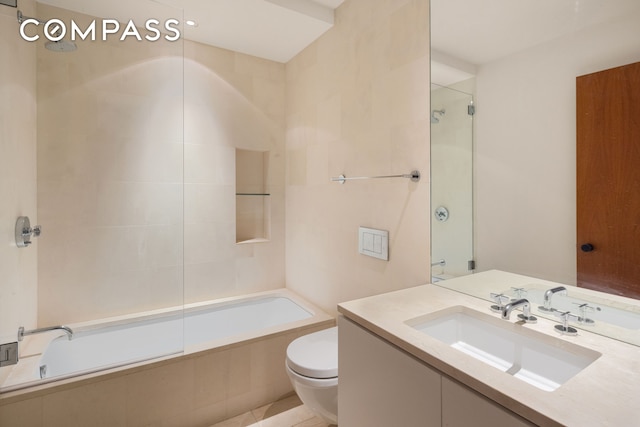 101 Wooster St Unit 3/4F, New York City, NY 10012 - bathroom with toilet, tiled shower / bath combo, and vanity