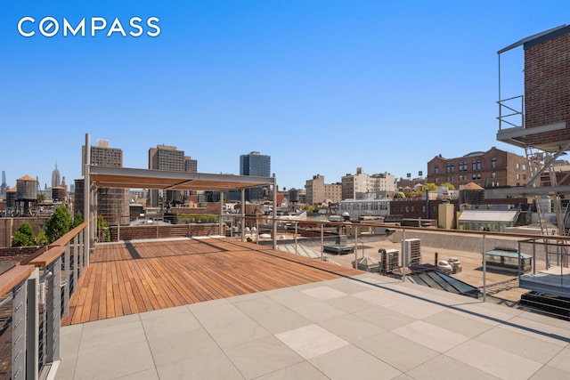 view of patio with a city view