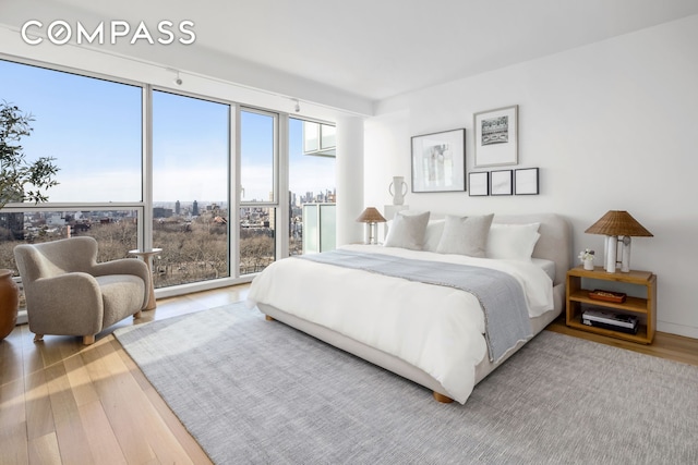 bedroom featuring wood finished floors