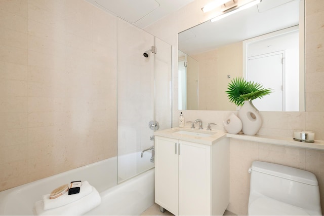 full bathroom with vanity, toilet, and bath / shower combo with glass door