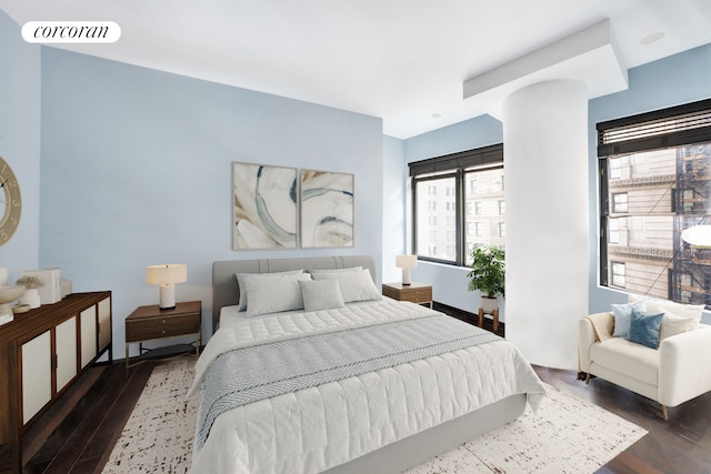 bedroom featuring dark wood-style floors