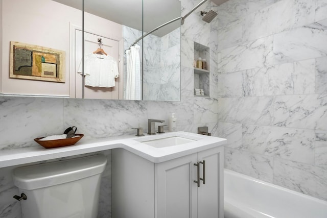 bathroom with decorative backsplash, vanity, toilet, and shower / bath combo with shower curtain