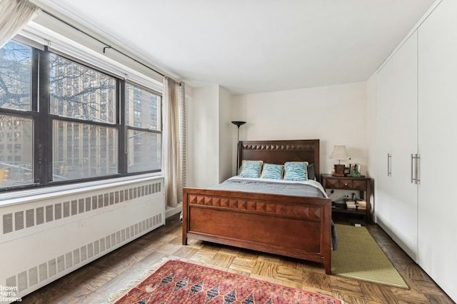 bedroom with radiator heating unit