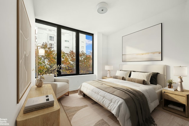 bedroom featuring wood finished floors