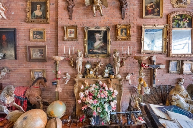 misc room with brick wall