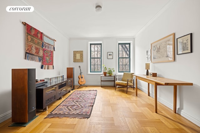 living area with ornamental molding, visible vents, and baseboards