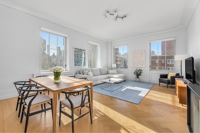 sunroom featuring a view of city and a wealth of natural light