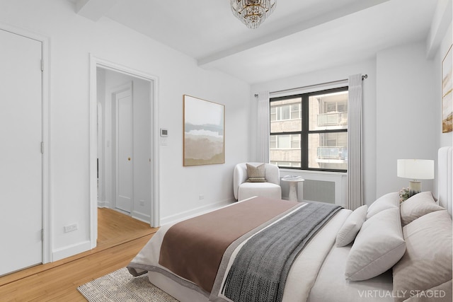 225 E 79th St Unit 7Cd, New York City, NY 10075 - bedroom featuring light wood-type flooring and baseboards