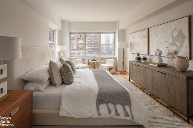 bedroom with light wood-style floors