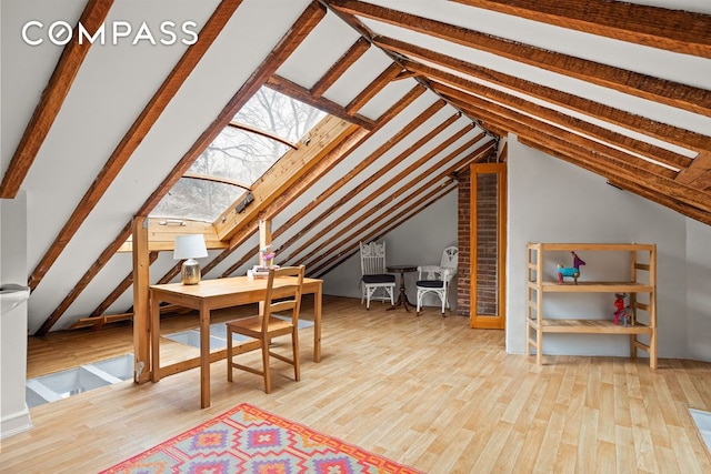 unfinished attic with a skylight