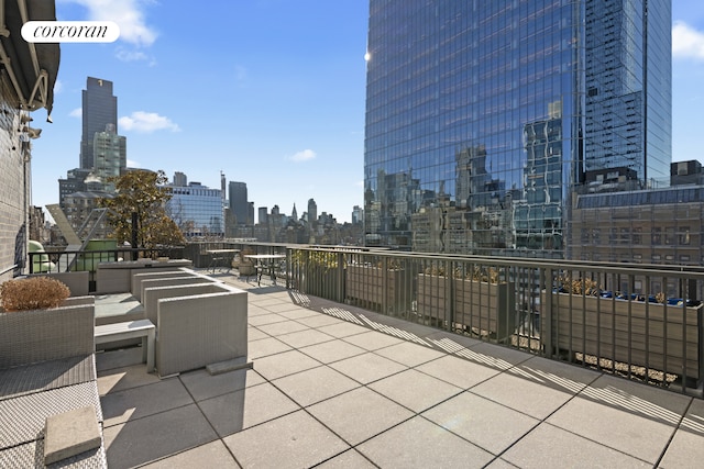 view of patio / terrace featuring a view of city