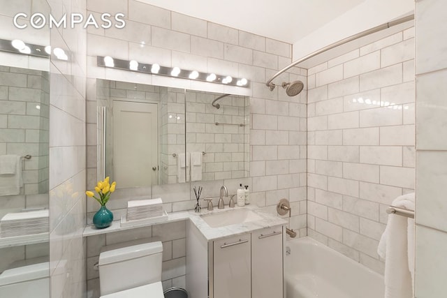 full bathroom featuring toilet, bathtub / shower combination, and vanity