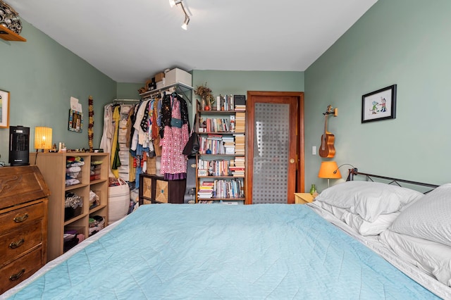 bedroom with track lighting