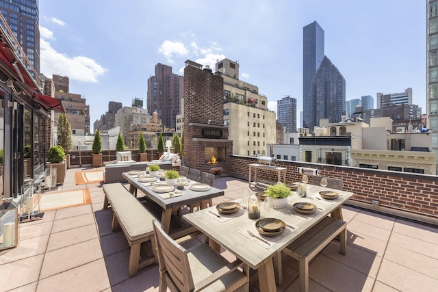 301 E 52nd St Phc, Phc, New York City, NY 10022 - view of patio with a view of city and outdoor dining area