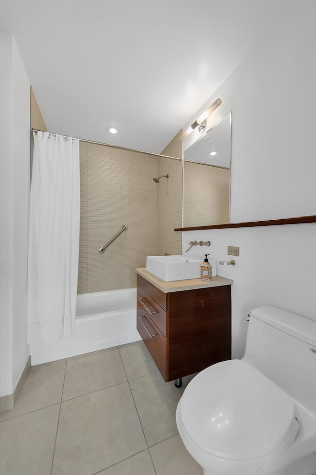 bathroom with tile patterned flooring, vanity, toilet, and shower / bath combo with shower curtain