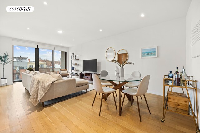 488 4th Ave Unit 6, New York City, NY 11215 - dining space featuring recessed lighting, baseboards, light wood-type flooring, and visible vents