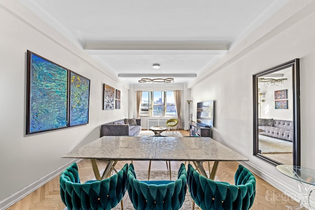 kitchen with ornamental molding and baseboards