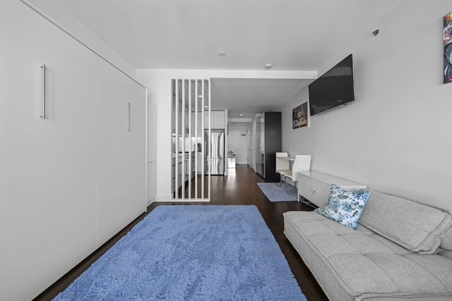 living area with wood finished floors