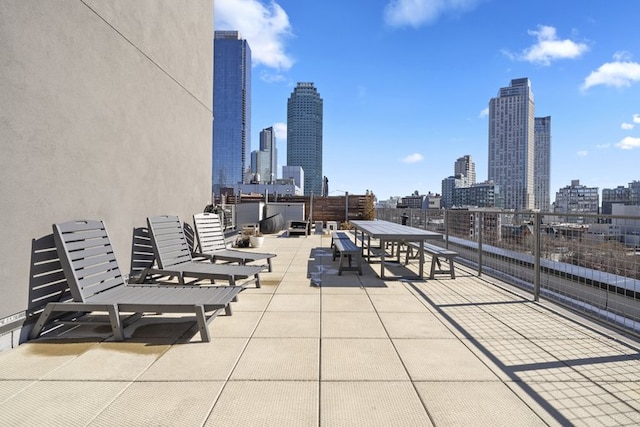 view of patio / terrace featuring a view of city