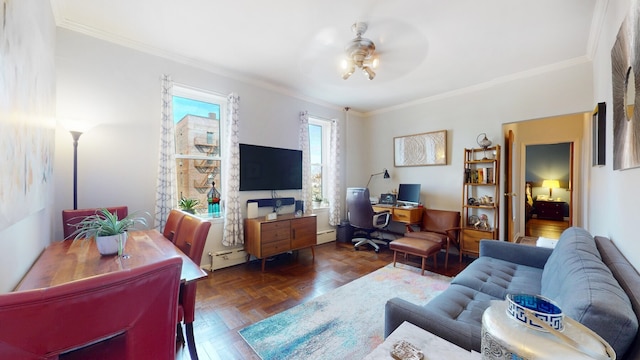 living room featuring crown molding, a baseboard heating unit, and a ceiling fan