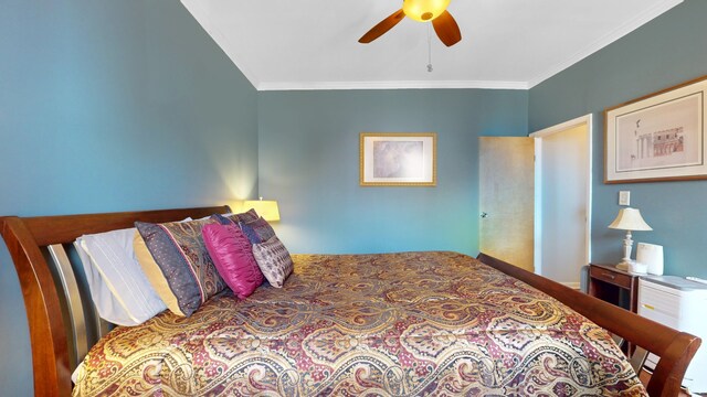 bedroom with ceiling fan and crown molding