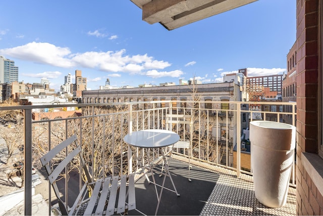 balcony featuring a view of city