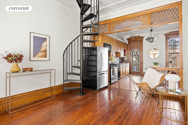 interior space with stairs, dark wood-style floors, and visible vents