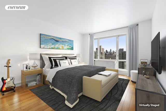 1280 5th Ave Unit 16B, New York City, NY 10029 - bedroom with visible vents and hardwood / wood-style floors