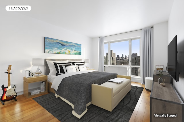 1280 5th Ave Unit 16B, New York City, NY 10029 - bedroom featuring hardwood / wood-style floors